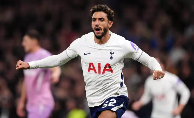 Tottenham Hotspur's Omar Marmoush celebrates scoring during the English Premier League soccer match between Tottenham Hotspur and Coventry City in London, Monday Oct. 19, 2026. (John Walton/PA via AP)