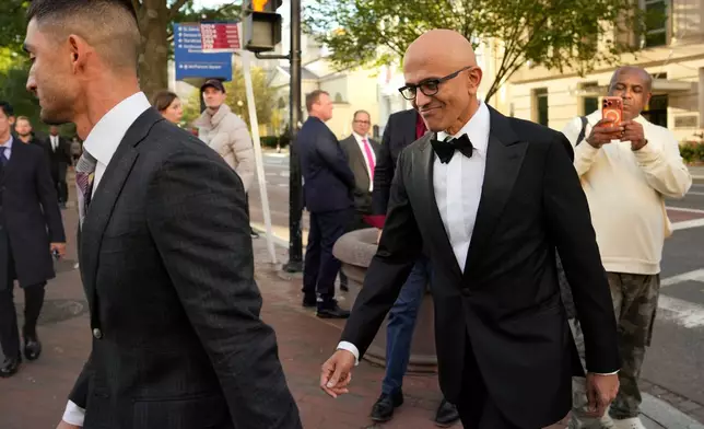 Microsoft CEO Satya Nadella walks to the White House to attend a state dinner hosted for China's President Xi Jinping, Thursday, Sept. 24, 2026, in Washington. (AP Photo/Carolyn Kaster)