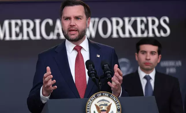 Vice President JD Vance speaks as Labor Secretary Keith Sonderling listens during a news conference on the Fraud Task Force inside the Eisenhower Executive Office Building on the White House campus, Thursday, Oct. 8, 2026, in Washington. (AP Photo/Tom Brenner)