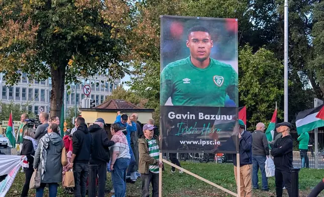 People call on the Football Association of Ireland to boycott Sunday's soccer game against Israel near the Aviva Stadium in Dublin on Thursday, Oct. 1, 2026. (Cillian Sherlock/PA via AP)