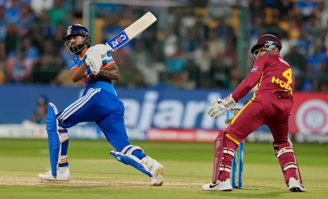 India's captain Shreyas Iyer plays a shot during the fifth T20 cricket match between India and West Indies in Bengaluru, India, Saturday, Oct. 17, 2026. (AP Photo/Aijaz Rahi)