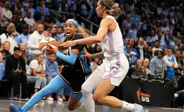 Atlanta Dream guard Jordin Canada (3) dribbles the ball during the second half of Game 3 of the WNBA basketball finals against the Golden State Valkyries on Wednesday, Oct. 21, 2026, in Atlanta. (AP Photo/Brynn Anderson)