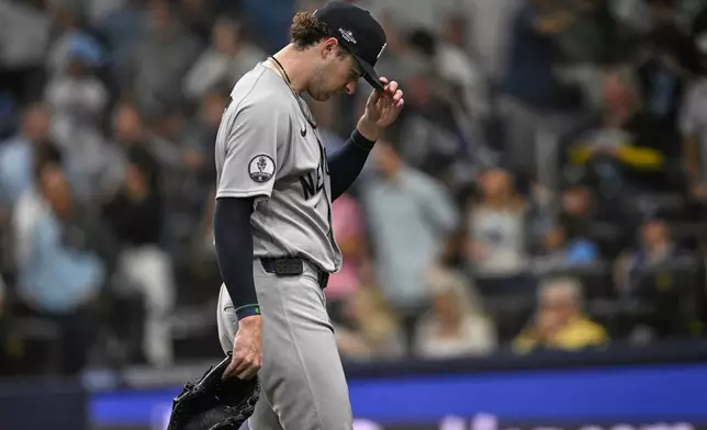 New York Yankees starting pitcher Cam Schlittler leaves Game 2 of an American League Division Series baseball game against the Tampa Bay Rays during the fifth inning Monday, Oct. 5, 2026, in St. Petersburg, Fla. (AP Photo/Phelan Ebenhack)