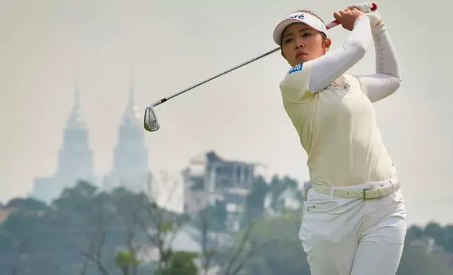 Miyu Yamashita of Japan plays a shot on the 6th hole during the third day of the LPGA Maybank Championship in Kuala Lumpur, Malaysia, Saturday, Oct. 31, 2026. (AP Photo/Vincent Thian)