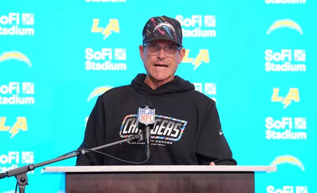 Los Angeles Chargers head coach Jim Harbaugh speaks during a news conference after the Broncos defeated the Los Angeles Chargers in an NFL football game, Sunday, Oct. 11, 2026, in Inglewood, Calif. (AP Photo/Scott Strazzante)