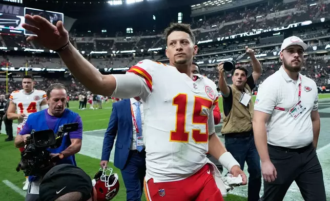 Kansas City Chiefs quarterback Patrick Mahomes (15) waves as he walks off the field after an NFL football game against the Las Vegas Raiders in Las Vegas, Sunday, Oct. 4, 2026. (AP Photo/John Locher)