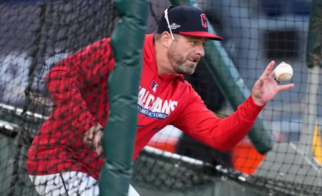 Cleveland Guardians manager Stephen Vogt hits during batting practice before Game 4 of an American League Championship Series baseball game against the Tampa Bay Rays in Cleveland, Saturday, Oct. 17, 2026. (AP Photo/David J. Phillip)