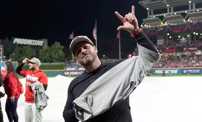 Cleveland Guardians manager Stephen Vogt celebrates after Game 5 of baseball's American League Division Series against the Chicago White Sox, Saturday, Oct. 10, 2026, in Cleveland. (AP Photo/Sue Ogrocki)