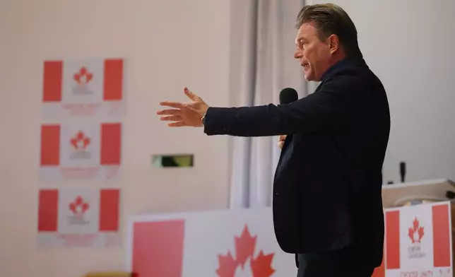 Forever Canadian founder Thomas Lukaszuk speaks at the pro-Canada watch party in Edmonton, Alberta Monday, Oct. 19, 2026. (James Maclennan/The Canadian Press via AP)