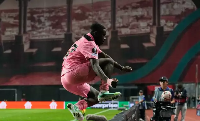 Sunderland's Noah Sadiki celebrates after scoring the second goal against Torreense during the Europa League opening phase soccer match between SCU Torreense and Sunderland AFC in Leiria, Portugal, Thursday, Oct. 15, 2026. (AP Photo/Ana Brigida)