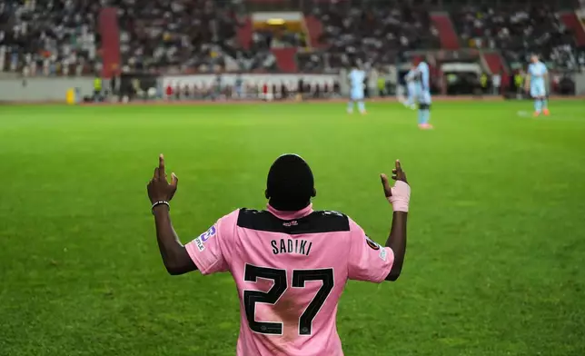 Sunderland's Noah Sadiki celebrates after scoring the second goal against Torreense during the Europa League opening phase soccer match between SCU Torreense and Sunderland AFC in Leiria, Portugal, Thursday, Oct. 15, 2026. (AP Photo/Ana Brigida)