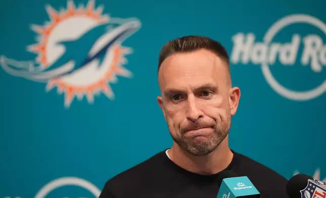 Miami Dolphins head coach Jeff Hafley listens to a question during a news conference following an NFL football game against the Cincinnati Bengals in Miami Gardens, Fla., Sunday, Oct. 11, 2026. (AP Photo/Rebecca Blackwell)