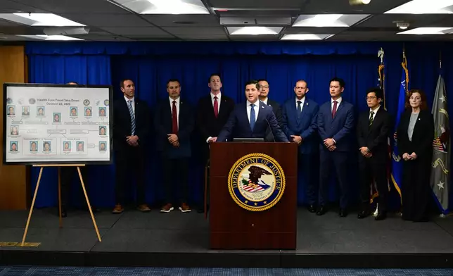 First assistant United States attorney for the Central District of California Bill Essayli speaks to the media during a press conference as he announces the arrests of fifteen defendants for health care fraud schemes on Thursday, Oct. 22, 2026, in Los Angeles. (AP Photo/Wally Skalij)