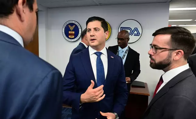 First assistant United States attorney for the Central District of California Bill Essayli talks after a press conference as he announced the arrests of fifteen defendants for health care fraud schemes on Thursday, Oct. 22, 2026, in Los Angeles. (AP Photo/Wally Skalij)