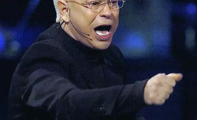 FILE -FILE - Televangelist Jim Bakker, founder of the former Heritage USA resort, delivers his sermon during the MorningStar Fellowship Church New Year's Conference, in Fort Mill, S.C.,Dec. 30, 2005. (AP Photo/Charlotte Observer, Jeff Siner, File)