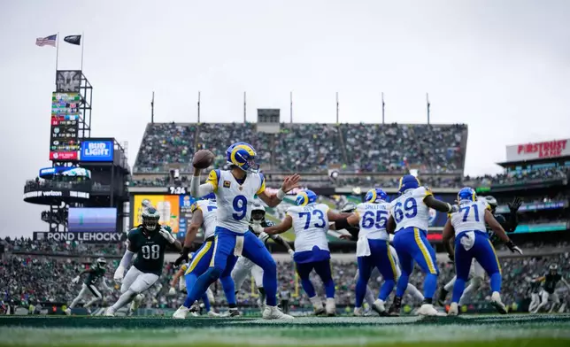 Los Angeles Rams quarterback Matthew Stafford (9) looks to pass during the second half of an NFL football game against the Philadelphia Eagles in Philadelphia, Sunday, Oct. 4, 2026. (AP Photo/Matt Slocum)
