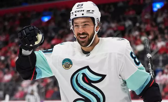 Seattle Kraken center Frederick Gaudreau (89) celebrates his goal against the Detroit Red Wings in the second period of an NHL hockey game Friday, Oct. 9, 2026, in Detroit. (AP Photo/Paul Sancya)