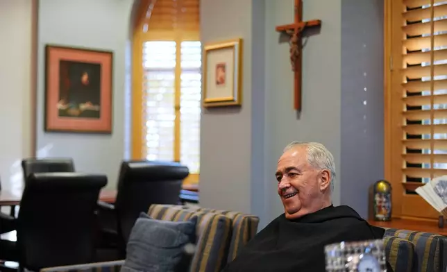 Villanova University President Rev. Peter M. Donohue speaks during an interview in his office Wednesday, Oct. 21, 2026, in Villanova, Pa. (AP Photo/Matt Rourke)