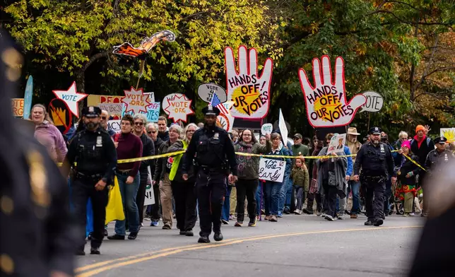 Protesters gather for a "No Kings" rally on Saturday, Oct. 17, 2026, in New York. (AP Photo/Madison Swart)