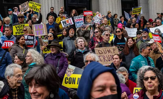 Protesters gather for a "No Kings" rally on Saturday, Oct. 17, 2026, in New York. (AP Photo/Madison Swart)