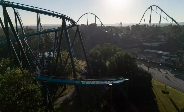 Attractions are seen at Six Flags Over Georgia, about 15 miles (24 kilometers) northwest of Atlanta, Tuesday, Oct. 13, 2026. (AP Photo/Mike Stewart)