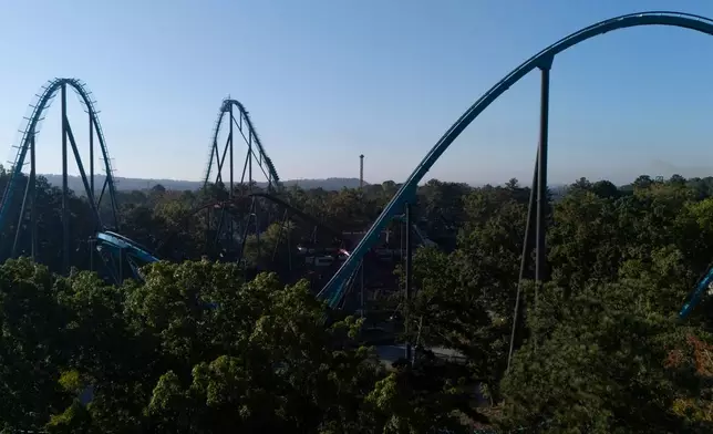 Attractions are seen at Six Flags Over Georgia, about 15 miles (24 kilometers) northwest of Atlanta, Tuesday, Oct. 13, 2026. (AP Photo/Mike Stewart)