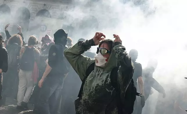 Students face Police during a protest against under-resourced schools, in Rennes, western France, Tuesday, Oct. 6, 2026. (AP Photo/Jeremias Gonzalez)