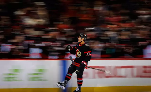 Ottawa Senators' Nick Cousins celebrates after his goal against the Philadelphia Flyers during the first period of an NHL hockey game in Ottawa, Ontario, Thursday, Oct. 8, 2026. (Keito Newman/The Canadian Press via AP)