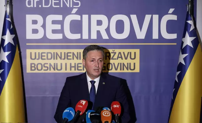 Denis Becirovic of Social Democratic Party (SDP) speaks at a news conference where he declared himself the winner of the Bosniak seat of the tripartite Bosnian Presidency in Sarajevo, Bosnia, Sunday, Oct. 4, 2026. (AP Photo/Armin Durgut)