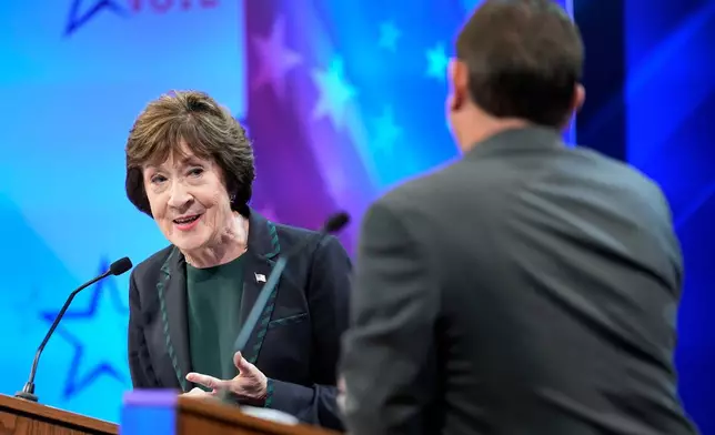 Sen. Susan Collins (R) looks to Troy Jackson (D) as he answers a question during the final Maine U.S. Senate debate in Bangor, Maine, on Thursday, Oct. 15, 2026. (Gregory A. Rec/Portland Press Herald via AP, Pool)