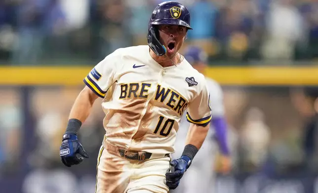 Milwaukee Brewers' Sal Frelick celebrates his home run during the sixth inning of Game 2 of baseball's World Series, Saturday, Oct. 24, 2026, in Milwaukee, between the Milwaukee Brewers and the Tampa Bay Rays. (AP Photo/Kayla Wolf)