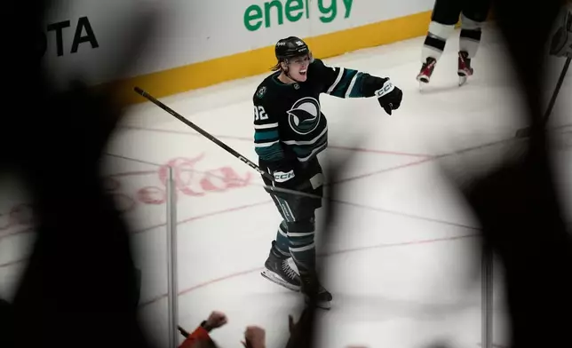 San Jose Sharks left wing Igor Chernyshov (92) celebrates after scoring during overtime of an NHL hockey game against the Los Angeles Kings, Saturday, Oct. 3, 2026, San Jose, Calif. (AP Photo/Jeff Chiu)