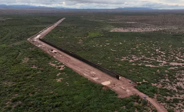A portion of border wall is under construction in the Big Bend region, Wednesday, Sept. 23, 2026, near Sierra Blanca, Texas. (AP Photo/John Locher)