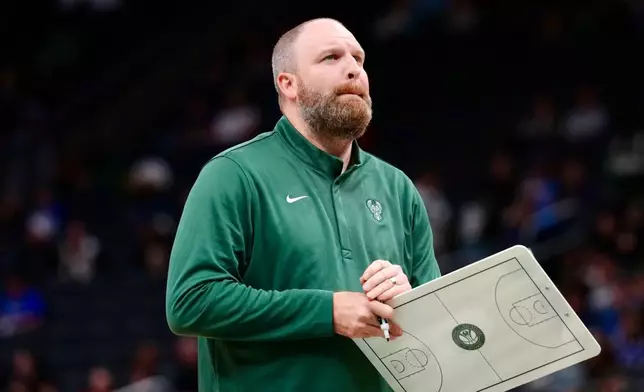 Milwaukee Bucks head coach Taylor Jenkins calls a timeout against the Chicago Bulls during the second half of an NBA preseason basketball game, Wednesday Oct. 14, 2026, in Milwaukee. (AP Photo/Ross Harried)