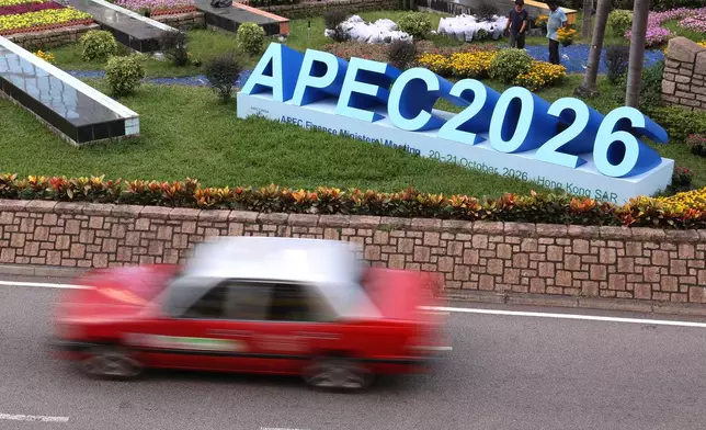 APEC signage is displayed in Hong Kong's financial district during the Asia-Pacific Economic Cooperation (APEC) Finance Ministers' Meeting on Tuesday, Oct. 20, 2026. (AP Photo/May James)