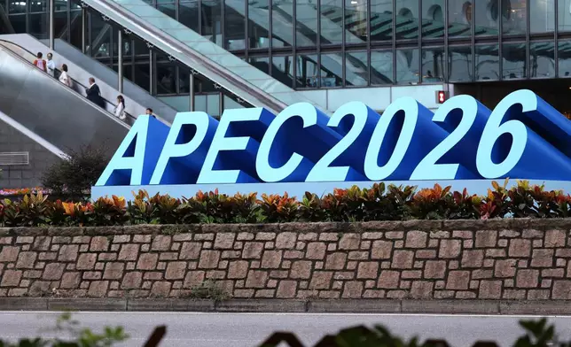 APEC signage is displayed in Hong Kong's financial district during the Asia-Pacific Economic Cooperation (APEC) Finance Ministers' Meeting, on Tuesday, Oct. 20, 2026. (AP Photo/May James)