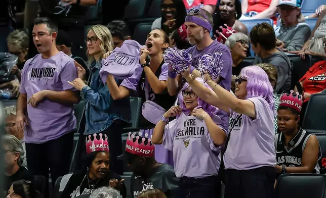 Valkyries fans celebrate Gabby Williams's (1) 2-point basket in the overtime period as the Golden State Valkyries defeated the Las Vegas Aces in Game 3 of the WNBA basketball semifinals Friday, Oct. 9, 2026, in Las Vegas. (Carlos Avila Gonzalez/San Francisco Chronicle via AP)