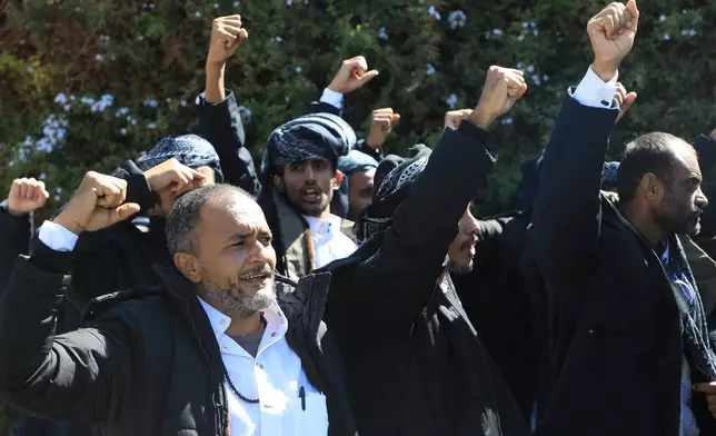 Prisoners detained in connection with Yemen's ongoing conflict react before they are freed by the Houthis in a release supported by the International Committee of the Red Cross, in Sanaa, Yemen, Saturday, Oct. 17, 2026. (AP Photo/Osamah Abdulrahman)
