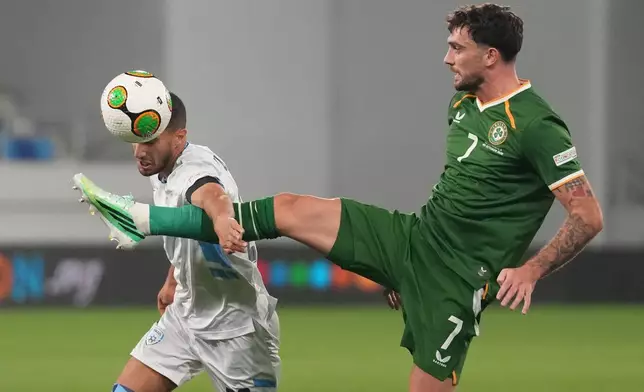 Israel's Liel Abada, left, and Ireland's Troy Parrott fight for the ball during the UEFA Nations League soccer match between the Republic of Ireland and Israel in Backa Topola, Serbia, Sunday, Oct. 4, 2026. (AP Photo/Darko Vojinovic)