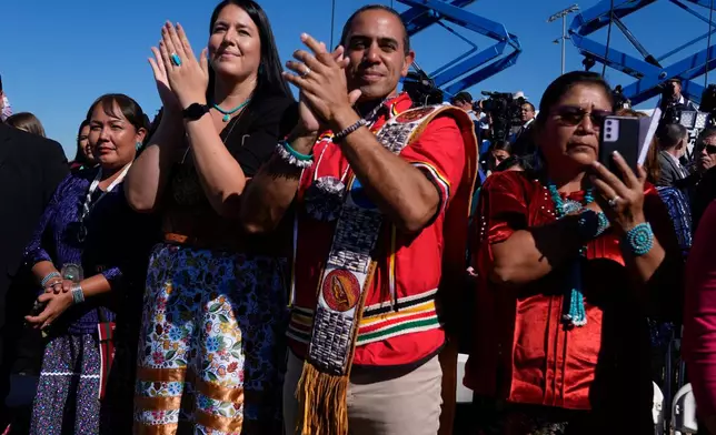 FILE - Attendees clap at an event with President Joe Biden at the Gila Crossing Community School in the Gila River Indian Community reservation in Laveen, Ariz., Friday, Oct. 25, 2024. (AP Photo/Manuel Balce Ceneta,File)