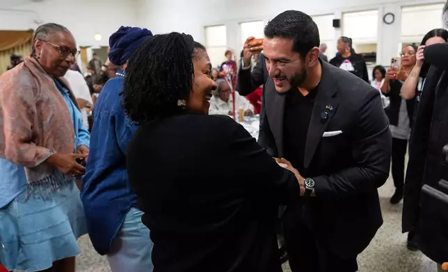 Democratic nominee for U.S. Senate Abdul El-Sayed greets supporters during a campaign event Wednesday, Oct. 14, 2026, in Detroit. (AP Photo/Paul Sancya)