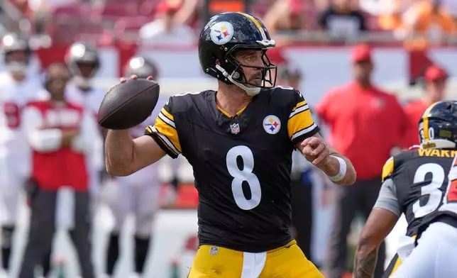 Pittsburgh Steelers quarterback Aaron Rodgers (8) aims a pass during the second half of an NFL football game against the Tampa Bay Buccaneers in Tampa, Fla., Sunday, Oct. 18, 2026. (AP Photo/Chris O'Meara)