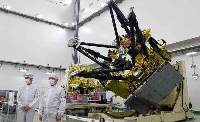 The Japan Aerospace Exploration Agency unveils a spacecraft for its Martian Moons eXploration mission at the Tanegashima Space Center in Minamitane, southwestern Japan, Aug. 13, 2026. (Yuika Kawazoe/Kyodo News via AP)