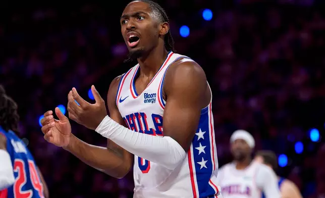 Philadelphia 76ers' Tyrese Maxey reacts to the foul called against him during the first half of an NBA basketball game against the Detroit Pistons, Sunday, Oct. 25, 2026, in Philadelphia. (AP Photo/Chris Szagola)