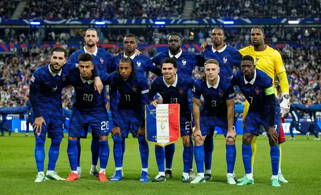 France's team players pose for a picture before the UEFA Nations League Group A soccer match between France and Italy in Saint-Denis near Paris, Friday, Oct. 2, 2026. (AP Photo/Teresa Suarez)