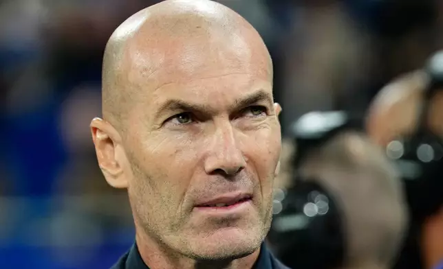 France's head coach Zinedine Zidane prepares for the start of the UEFA Nations League Group A soccer match between France and Italy in Saint-Denis near Paris, Friday, Oct. 2, 2026. (AP Photo/Teresa Suarez)