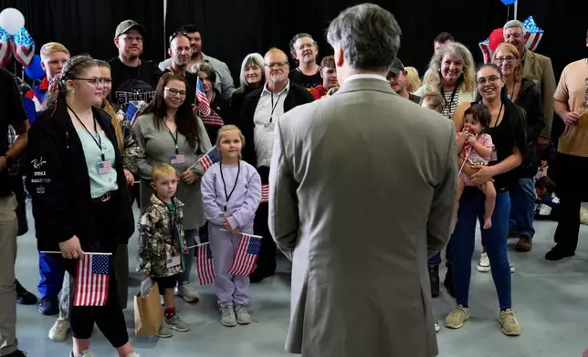 FILE - Deputy Secretary of State Christopher Landau greets Afrikaner refugees from South Africa, May 12, 2025, at Dulles International Airport in Dulles, Va. (AP Photo/Julia Demaree Nikhinson, File)