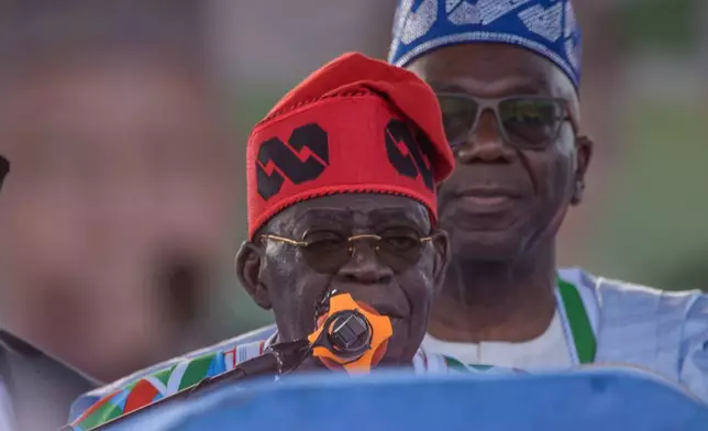 President Bola Tinubu, with the All Progressives Congress Party, speaks during the first election campaign of the season in Kaduna, Nigeria, Saturday, Oct. 24, 2026. (AP Photo/Sani Maikatanga)