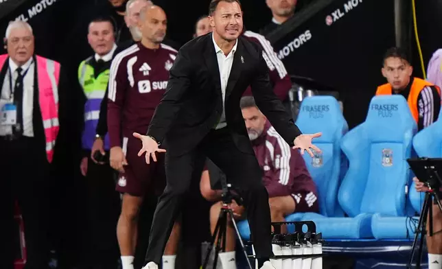 Newcastle United's manager Matthias Jaissle gestures during the English Premier League soccer match between Coventry City and Newcastle United in Coventry, England, Monday, Oct. 12, 2026. (Bradley Collyer/PA via AP)