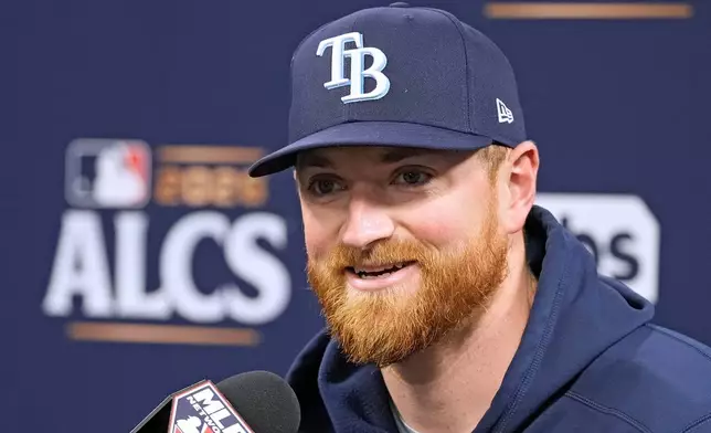 Tampa Bay Rays pitcher Drew Rasmussen speaks to the media before practice in a baseball American League Championship against the Cleveland Guardians Series Sunday, Oct. 11, 2026, in St. Petersburg, Fla. (AP Photo/Chris O'Meara)